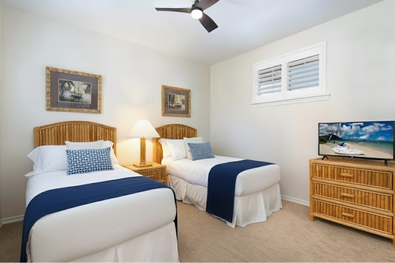 Guest room with two Twin beds and Smart TV, great for kids or friends traveling together.