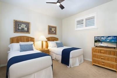 Guest room with two Twin beds and Smart TV, great for kids or friends traveling together.