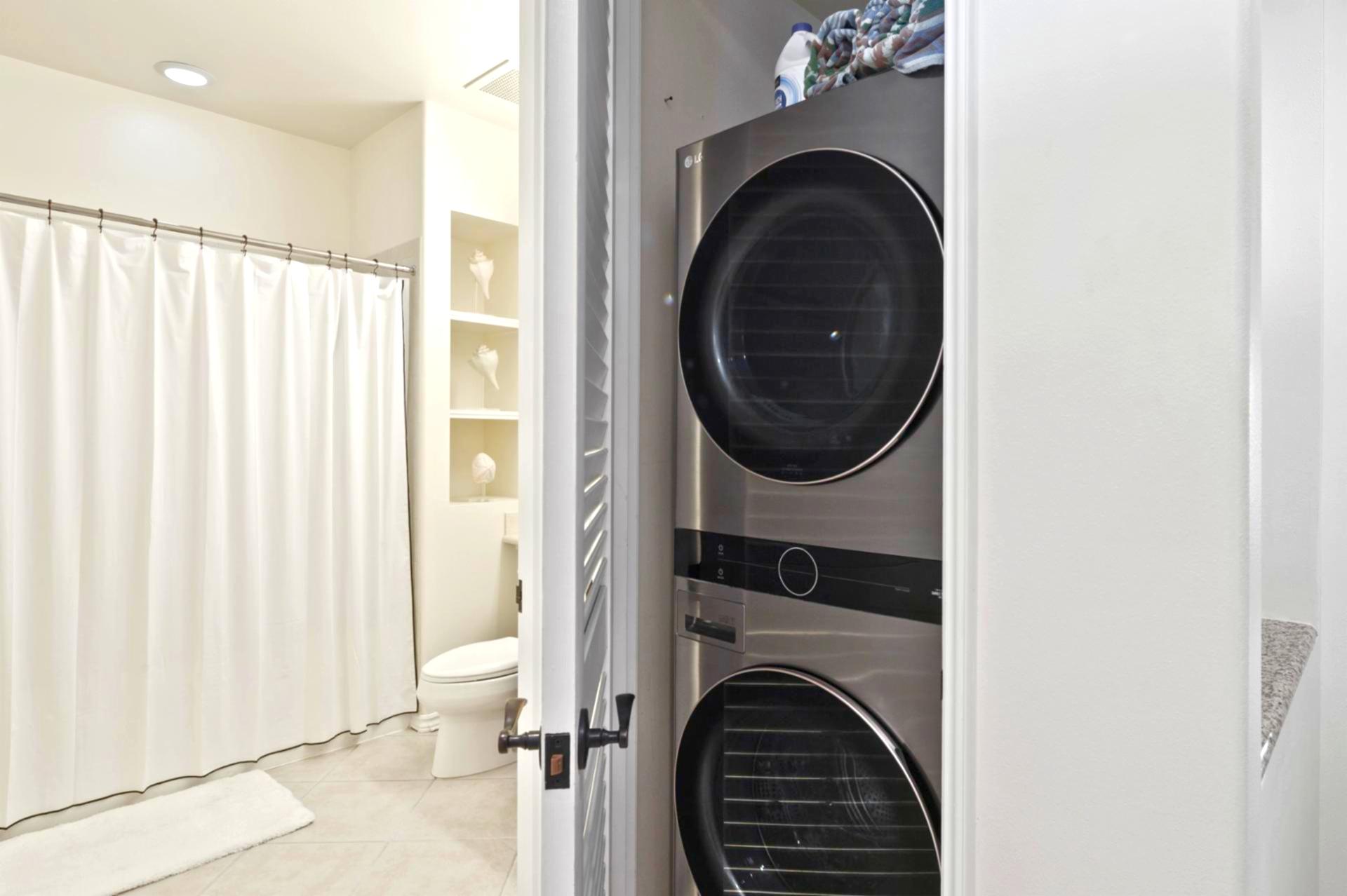 In-unit laundry with full-size washer and dryer for easy cleanup after beach days.