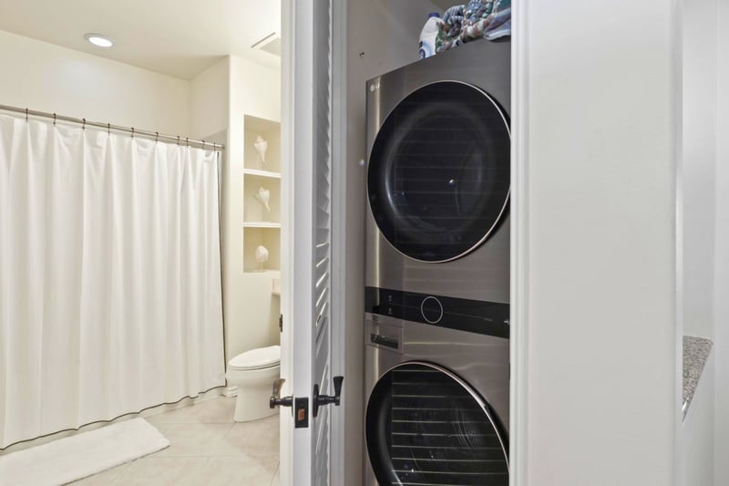 In-unit laundry with full-size washer and dryer for easy cleanup after beach days.