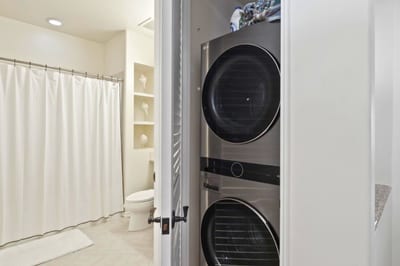 In-unit laundry with full-size washer and dryer for easy cleanup after beach days.