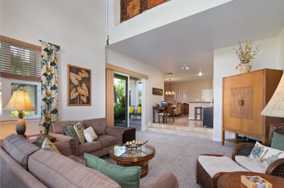 Stylish and welcoming living area with cozy seating and island accents