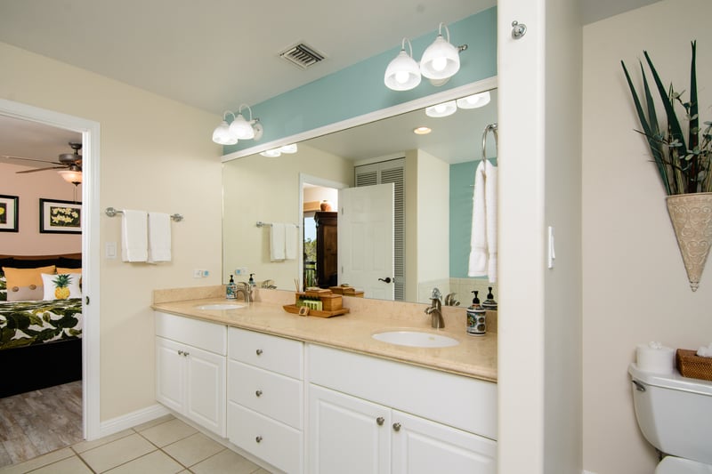 Double vanity bathroom with spacious layout and warm finishes WCV-305