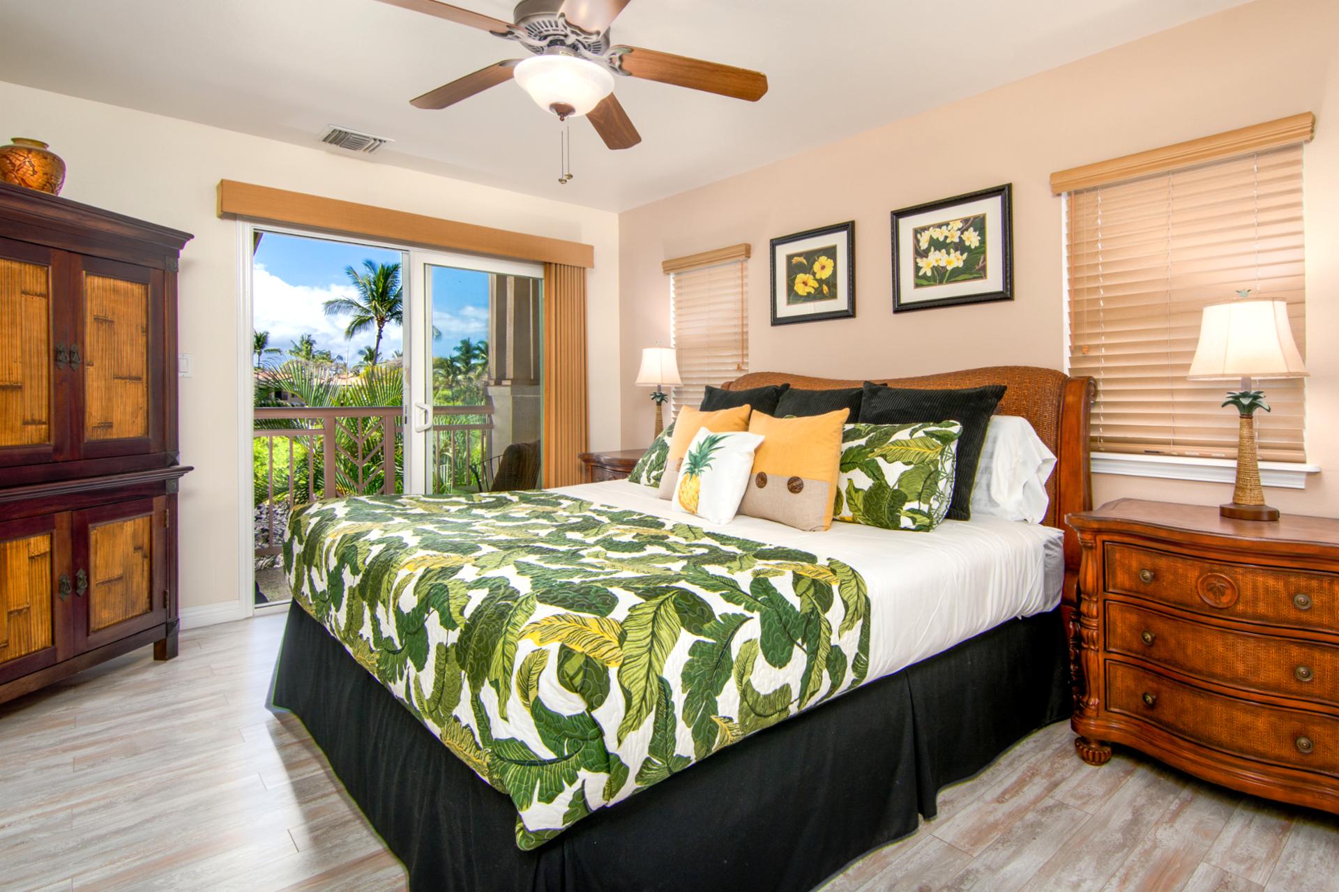Spacious master suite with tropical bedding and private lanai access
