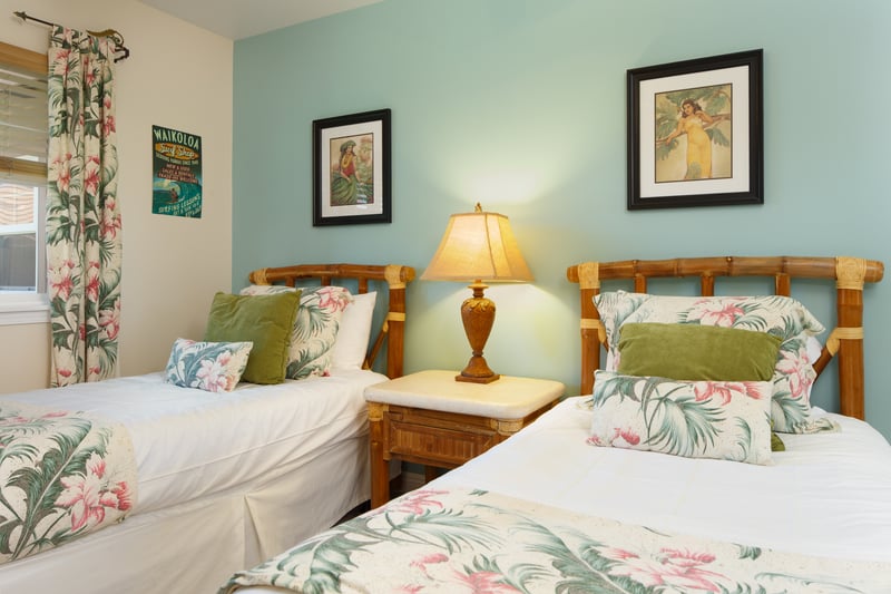 Bright twin room with coordinated patterns and soft lighting WCV-305