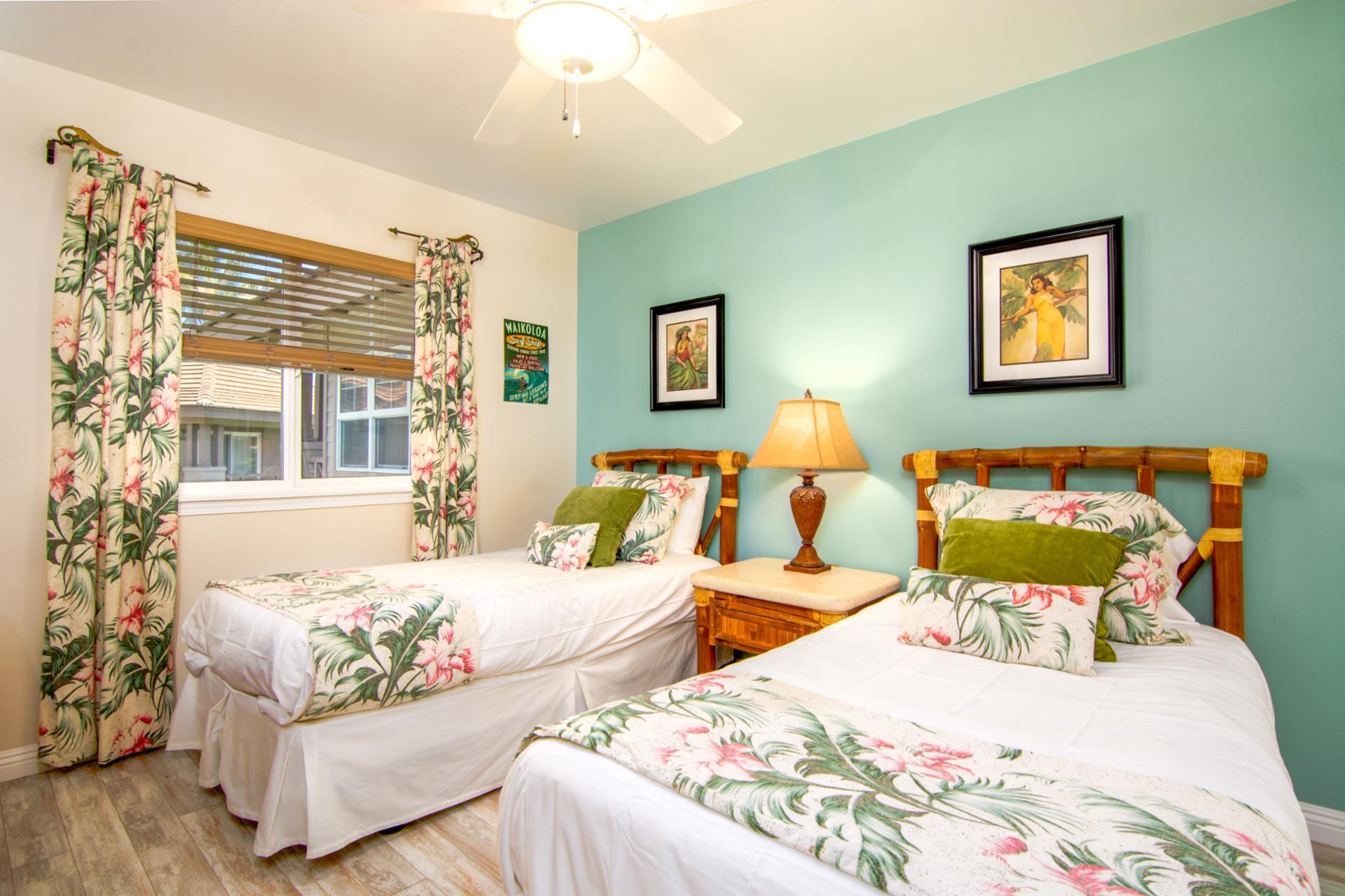 Twin bed setup with playful prints and breezy island style