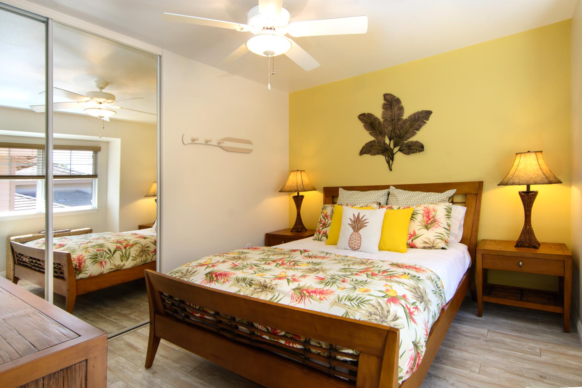 Cozy guest bedroom with floral bedding and serene garden views