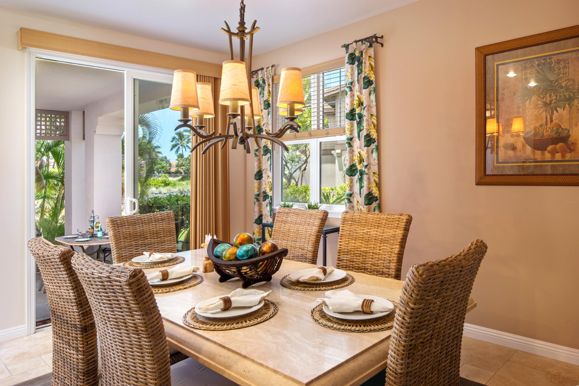Gather for meals in this warm and inviting dining area with tropical charm