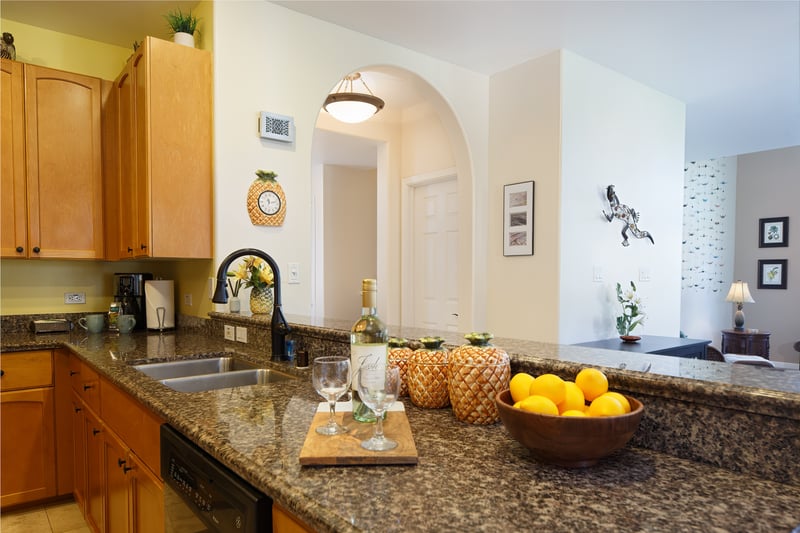 Beautiful granite kitchen ready for home-cooked island meals WCV-305
