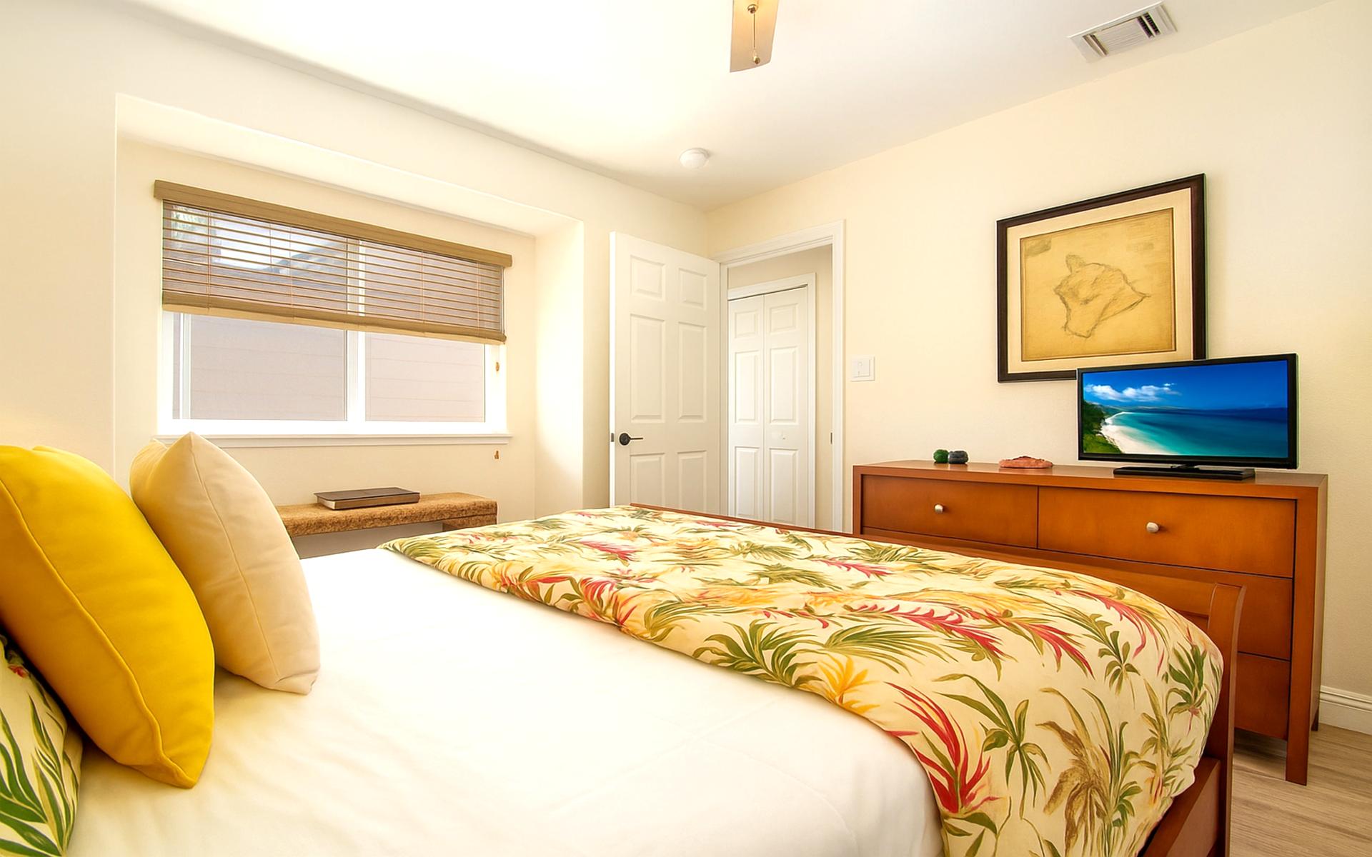 Peaceful bedroom with classic island touches and soft tones