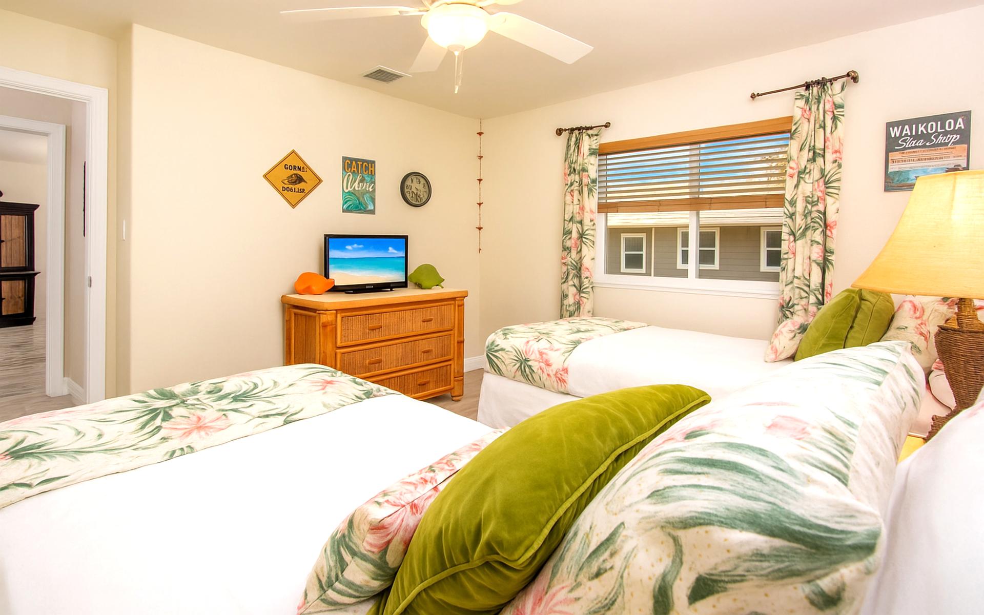 Colorful and cheerful twin bedroom with tropical flair