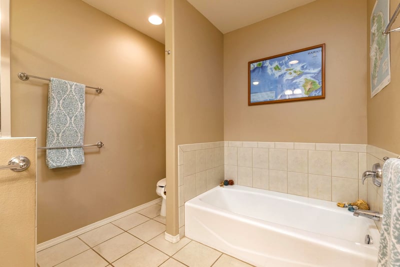 Enjoy a spa-like experience with elegant finishes and a deep soaking tub