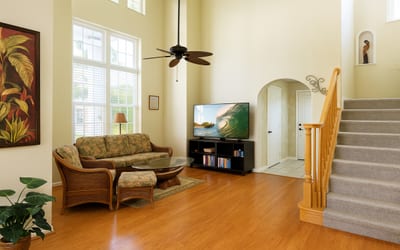 Enjoy serene mornings with garden views from your stylish and sunlit living room