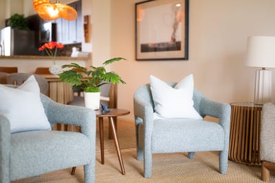The living room offers a welcoming space to gather, relax, or watch a movie FVW-L21