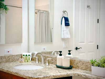 Clean, well-appointed and conveniently located, the guest bathroom adds comfort for every guest