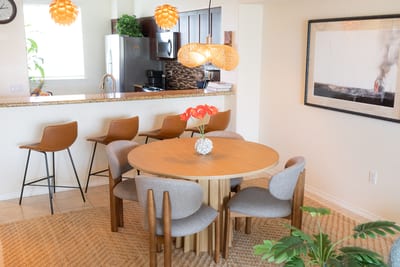The thoughtfully decorated dining area sits at the heart of the home, bringing everyone together for relaxed vacation living FVW-L21