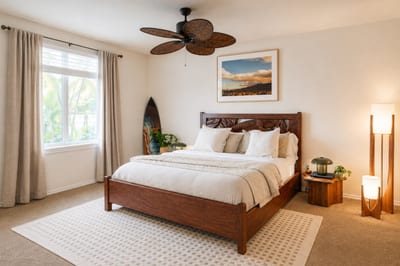 Relaxing primary suite with a king size bed and warm, island inspired decor FVW-L21