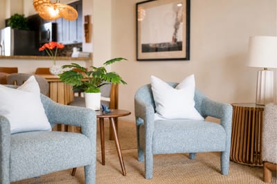 The living room offers a welcoming space to gather, relax, or watch a movie FVW-L21