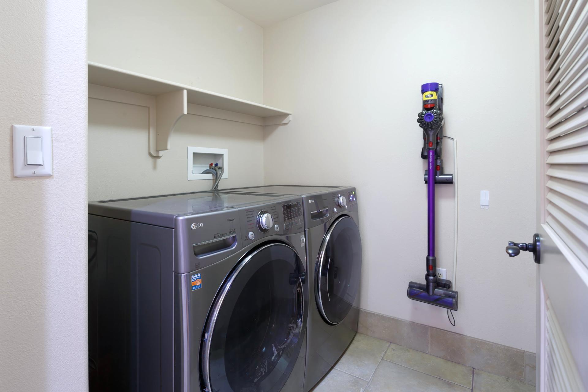 Keep your clothes fresh and ready with this tucked-away in-unit laundry setup