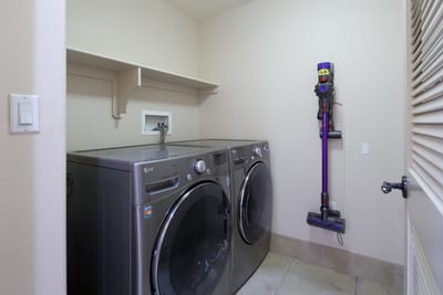Keep your clothes fresh and ready with this tucked-away in-unit laundry setup HLI-12A