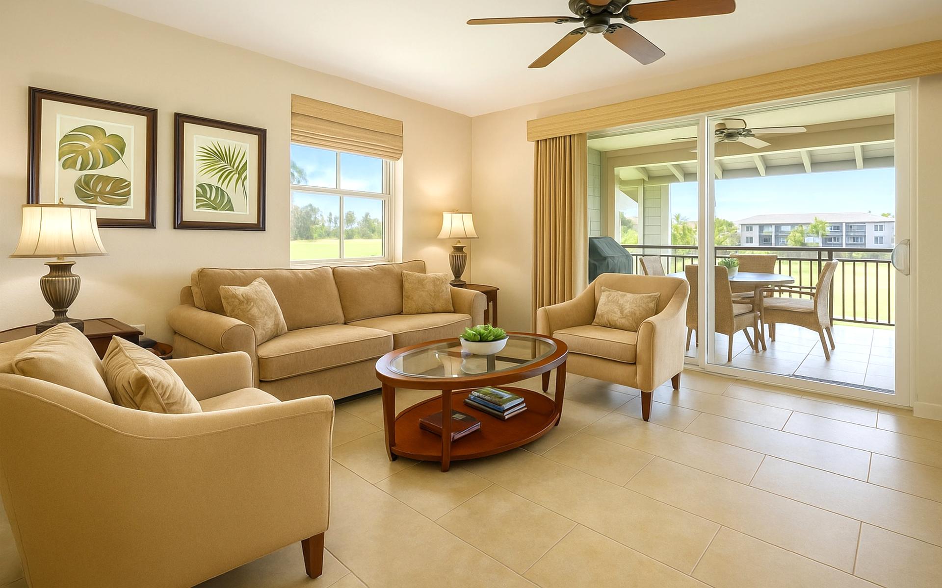 Open, airy living room with calming hues and seamless access to the outdoor lanai