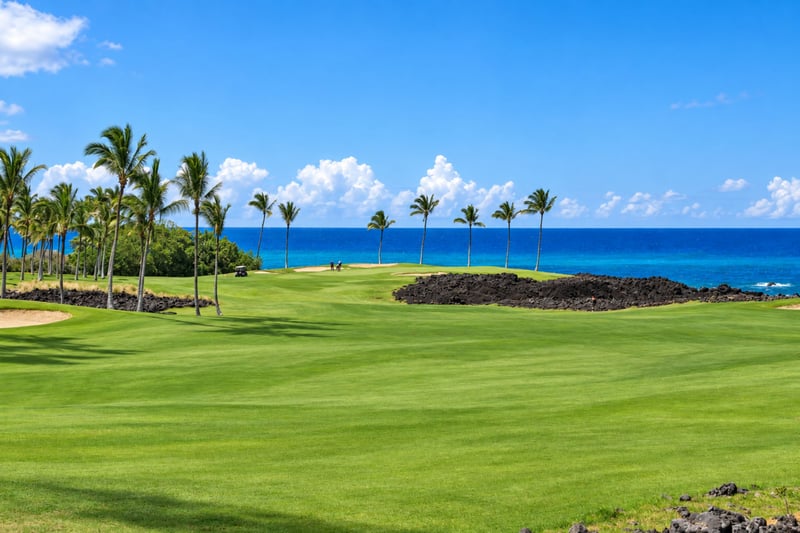 Fairways of the Waikoloa Beach Golf Course lead toward the Pacific, giving your lanai an open, resort-style backdrop for morning coffee. HLI-12A