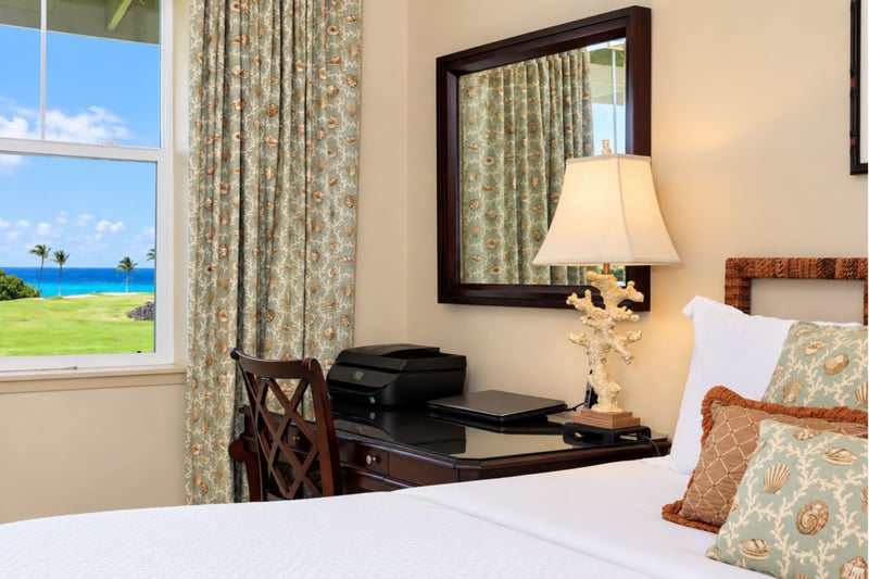 A private desk nook in your primary bedroom offers ocean views, a comfortable spot for morning coffee or catching up on email. HLI-12A