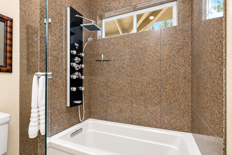 A second view of your guest bathroom highlights the tub, shower, and vanity, giving you a full sense of the space. HLI-12A