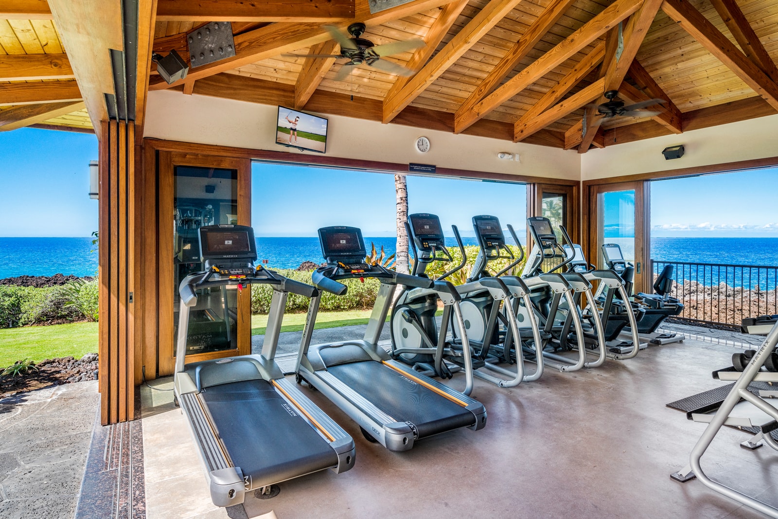Stay active in the well-equipped fitness center overlooking the resort and ocean beyond.