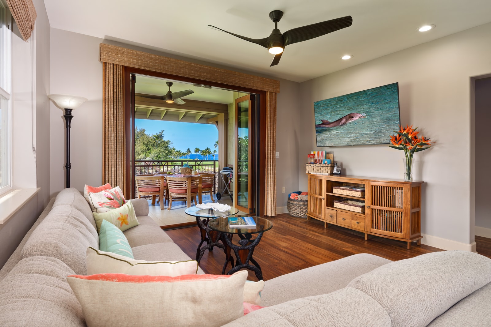 Relax in a bright living room designed for island comfort