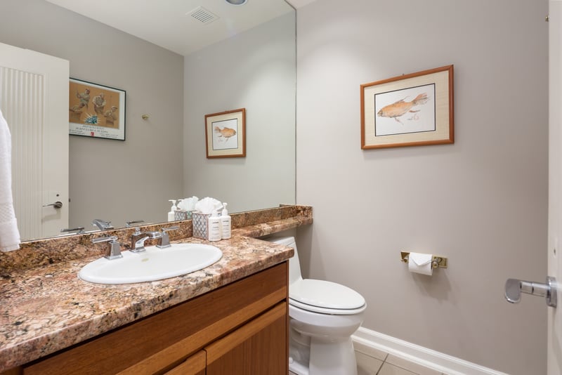 Additional convenient half-bath/powder room on the main level for guests.