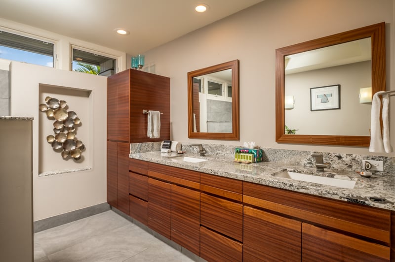 Spa-like master bathroom with dual vanities and a massive walk-in shower.