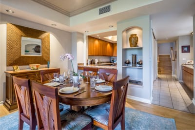 Gather around the beautiful wooden dining table for memorable vacation dinners.