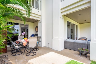 Your outdoor dining area, equipped with a BBQ, connects to the outdoor lounge on the other side.