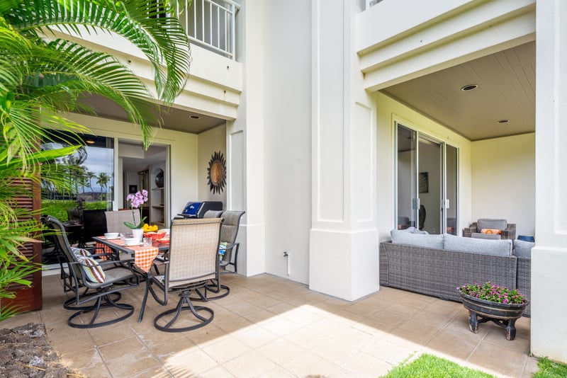 Your outdoor dining area, equipped with a BBQ, connects to the outdoor lounge on the other side.
