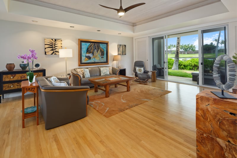 Enjoy abundant natural light and elegant island decor in the main living space.