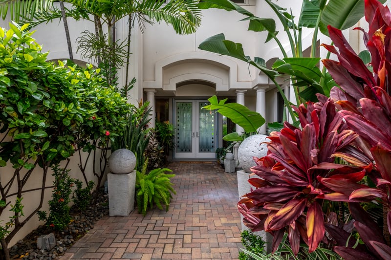 Welcome to your tropical paradise! A lush, private entrance greets you upon arrival.