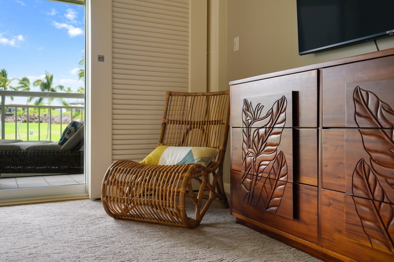 Unwind with a good book in the primary bedroom's private sitting area.