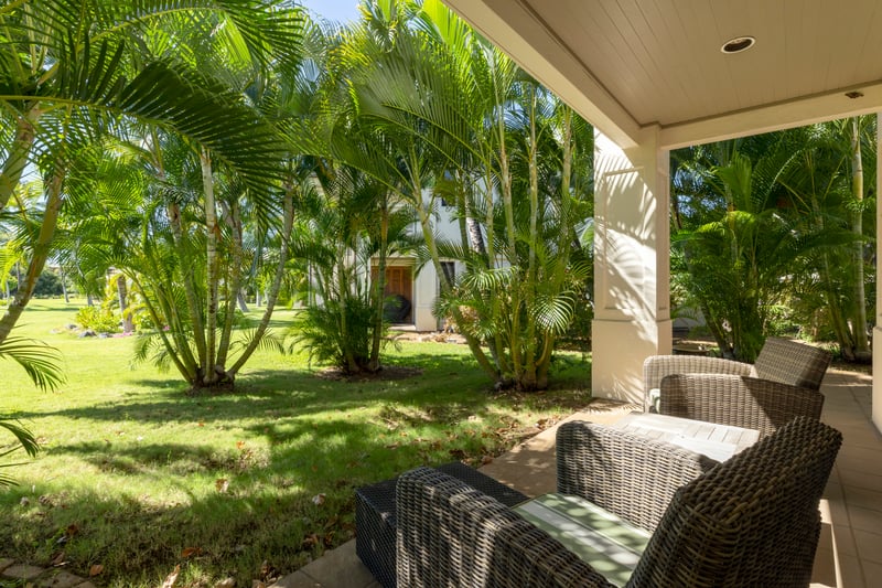 Elegant outdoor living—perfect for morning reads or evening wine under the trees