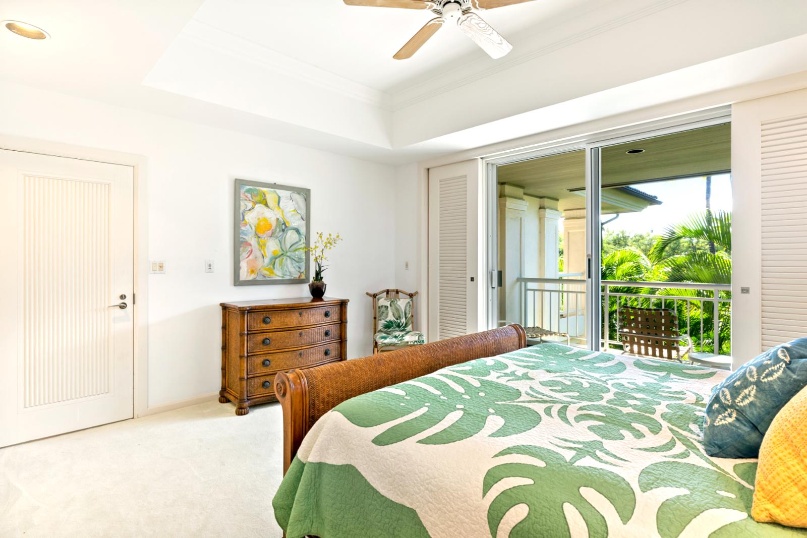 A lush island escape awaits, spacious room, crisp whites, vibrant art, and garden breezes