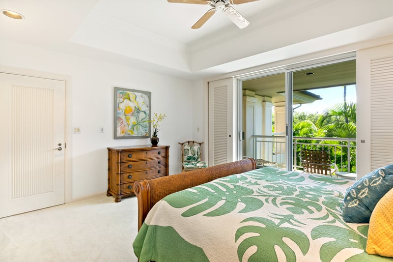 A lush island escape awaits, spacious room, crisp whites, vibrant art, and garden breezes