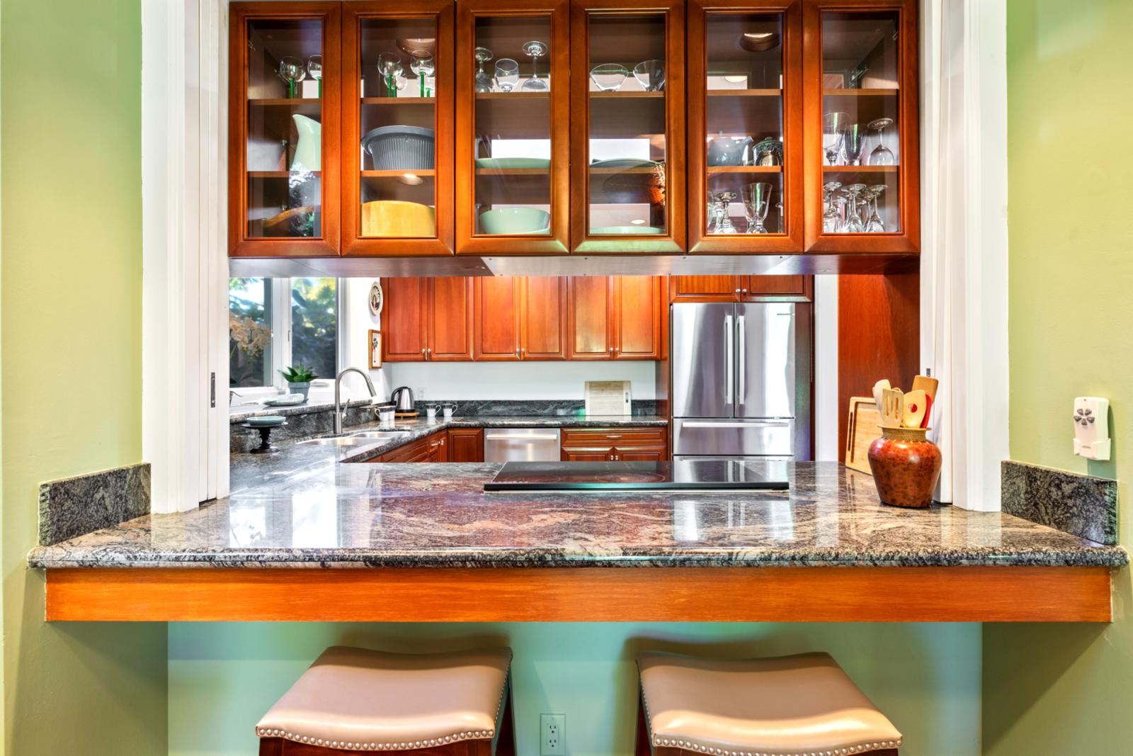 Dine, entertain, and unwind in this elegant island kitchen