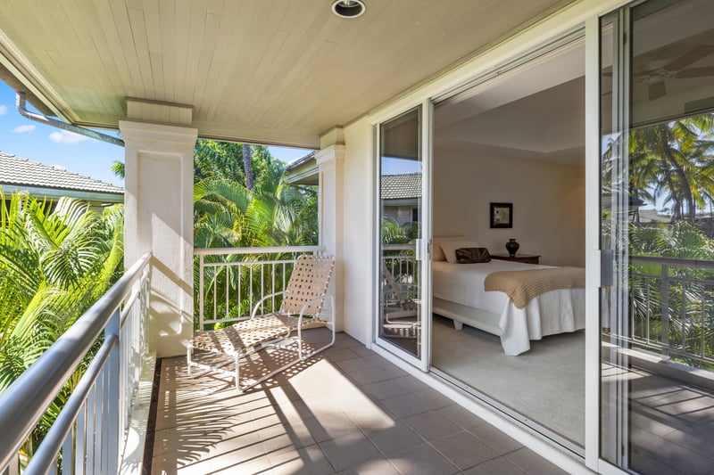 Start your day with coffee and palm views from your private lanai in this elegant island suite
