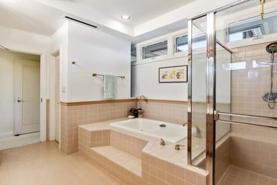 End each day with a sunset rinse in your glass shower retreat