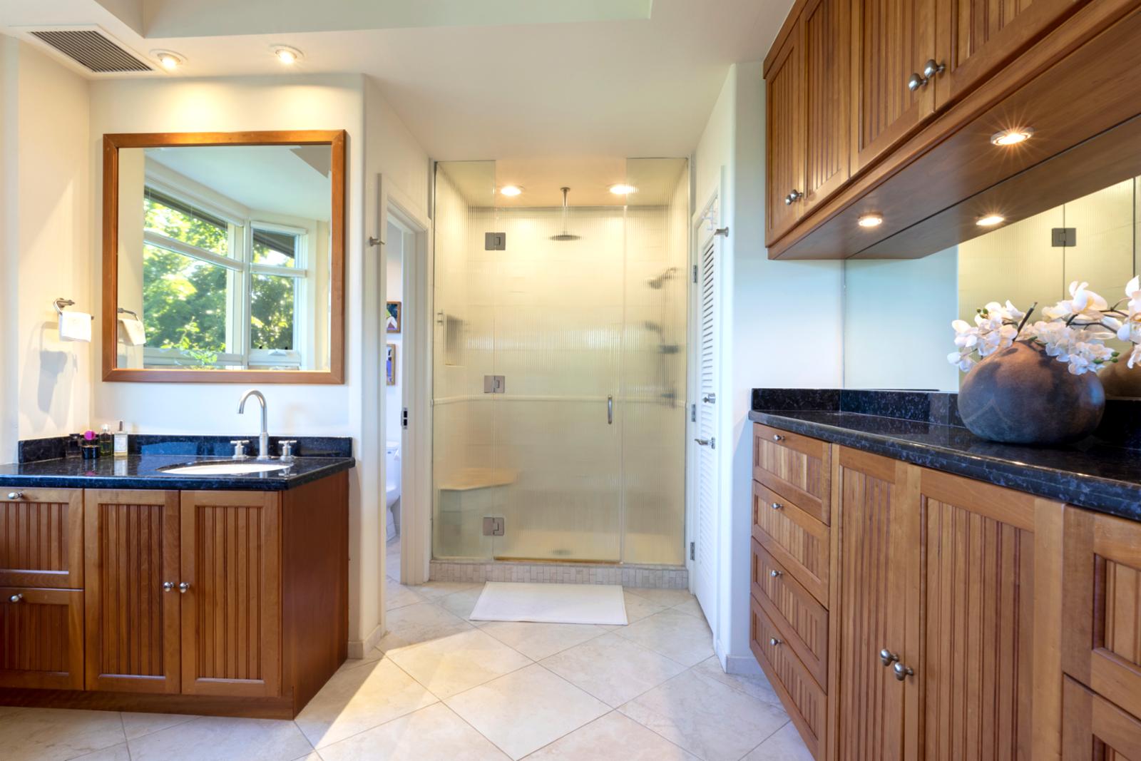 Modern island vibes meet natural elegance in this light-filled bath oasis