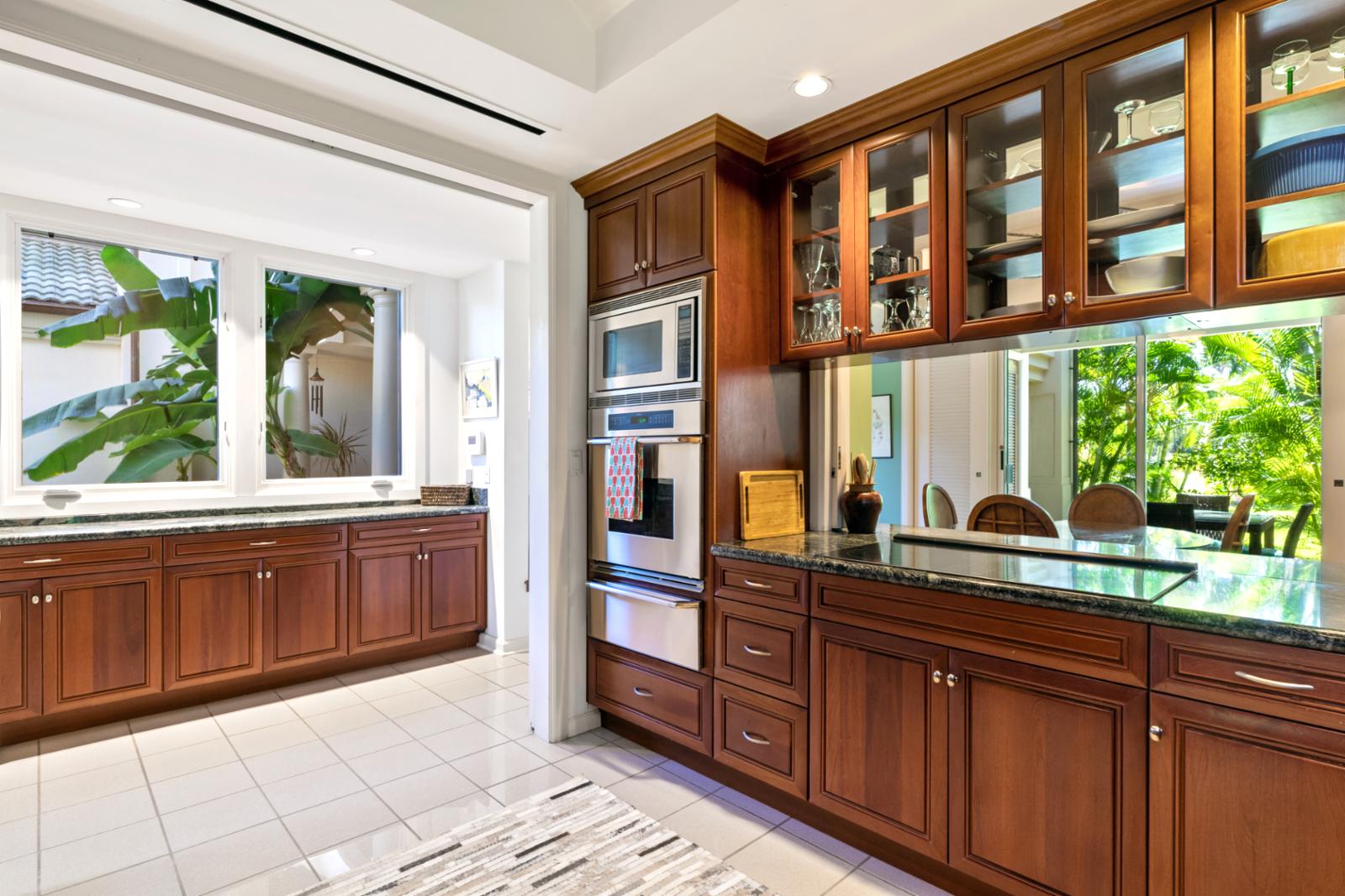 Sunlit mornings and savory evenings begin in this warm, refined kitchen