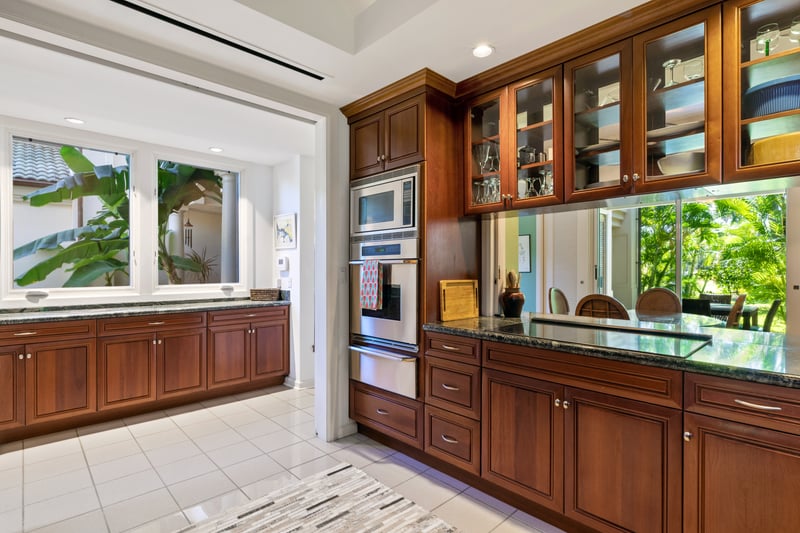 Sunlit mornings and savory evenings begin in this warm, refined kitchen