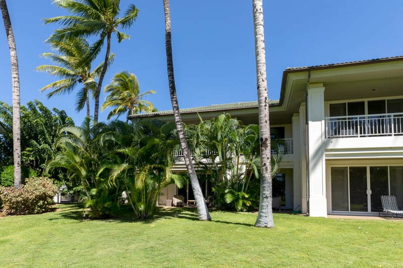 Surrounded by palms and kissed by sunshine, this backyard is made for peaceful island moments