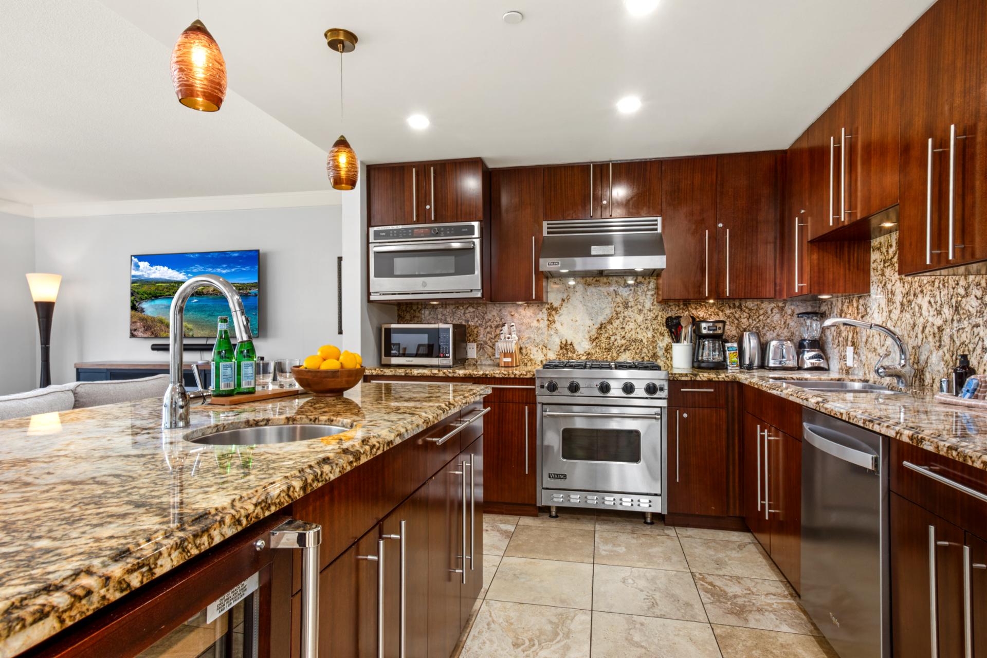 A sleek kitchen built for cooking, unwinding, or a quick beach snack