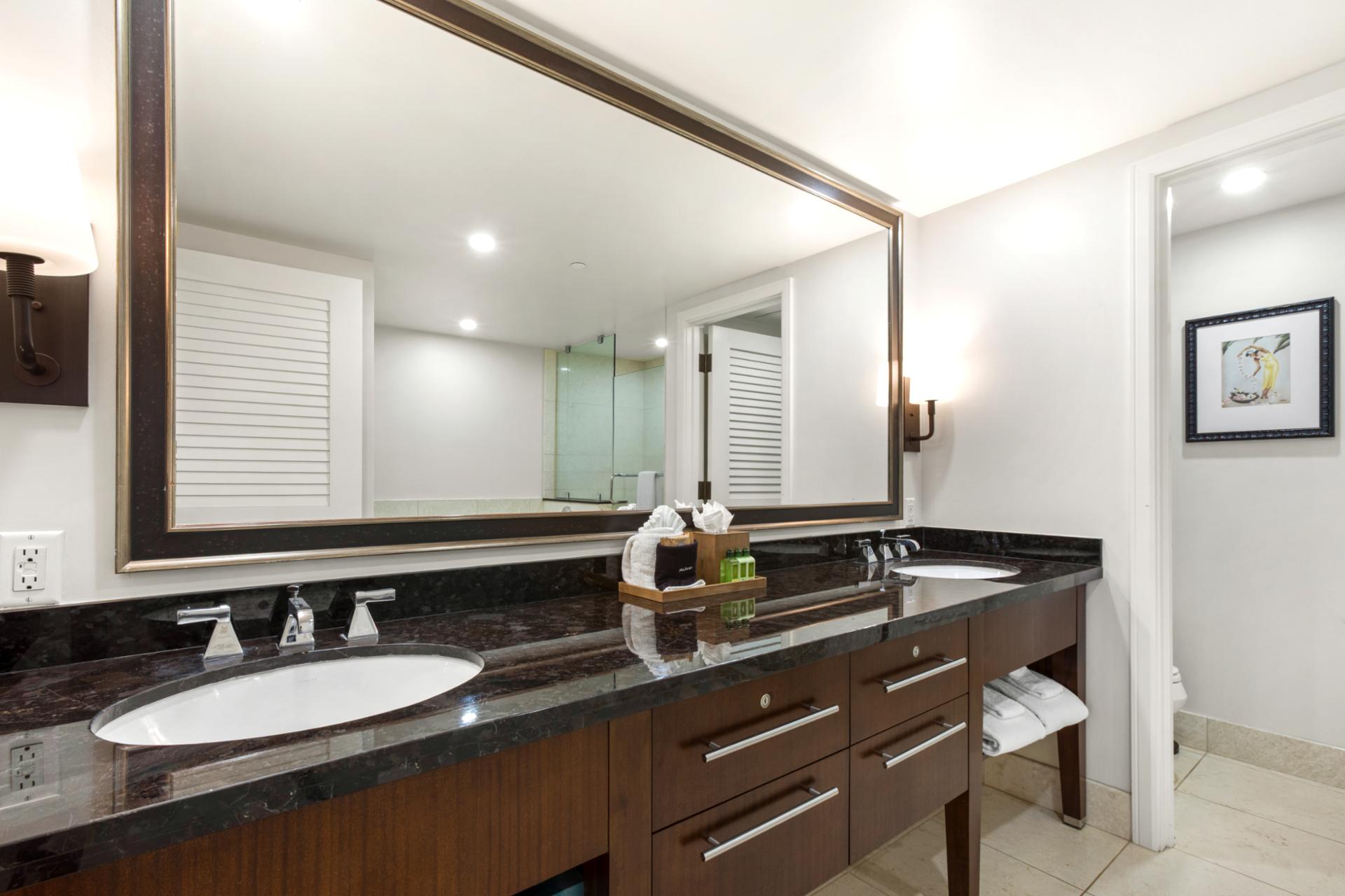Spa-like guest bath with double vanity and plenty of room for your whole group to get ready.